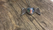 Load and play video in Gallery viewer, Photo Locket - &#39;Angel Wings&#39; Heart Photo Necklace - Gold &amp; Silver - Upload Your Picture
